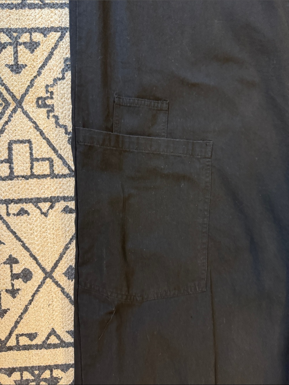Sleeveless Black Jumpsuit with Front Buttons and utility pockets - Picture 11 of 12